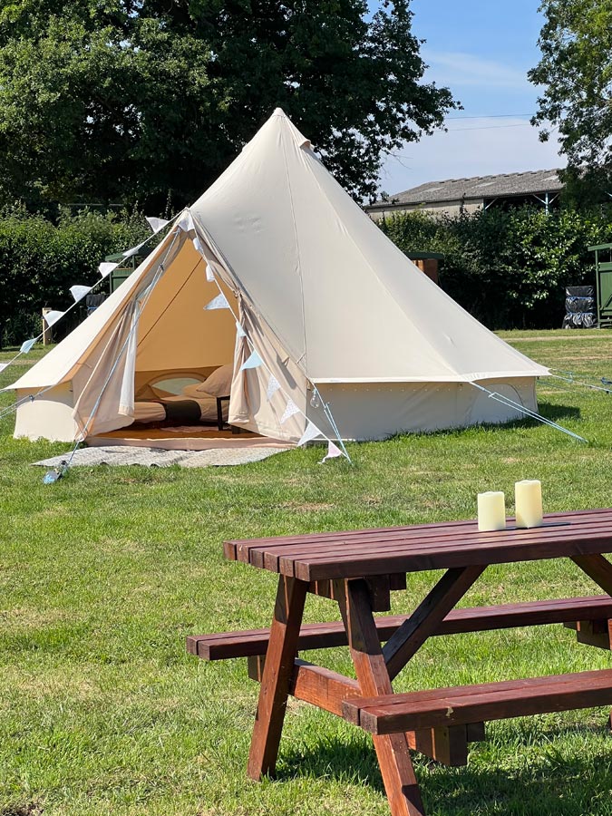 Glamping field and table